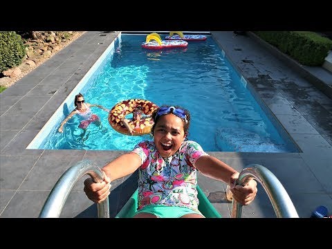WATER SLIDE IN OUR SWIMMING POOL!!