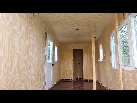 Installing Ceiling and Wall Boards in the Container
