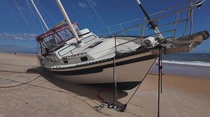 Sailboat remains abandoned on Florida beach for over a month