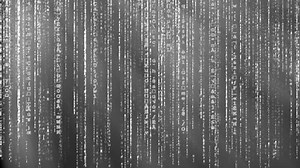 Black and white animated matrix background, computer code with symbols and characters.