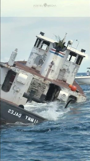 Water Rushes in Sinking Tugboat