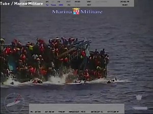 Italian coast guard captures over-crowded migrant boat capsizing in the Mediterranean